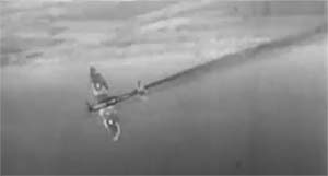 Spitfire aircraft on fire diving